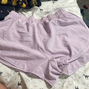 These are lilac/light purple nike shorts size XL I have worn them maybe once.